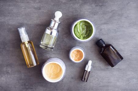 bottles and jars on grey background