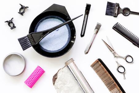 flatlay of tools for hair colour at home