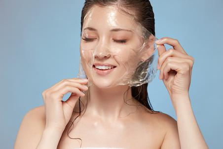 girl wearing a clear peel-off mask