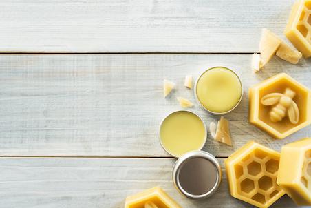 natural lip balms on wooden table