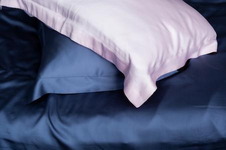 Silk pillows in blue and pink