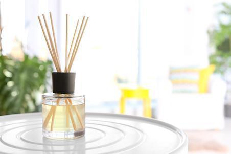 Reed diffuser on a white table