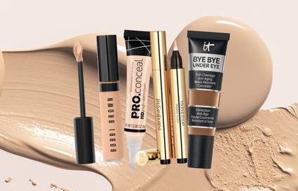 4 different concealers on a background of face makeup swatches