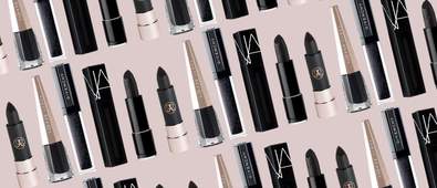 five black lipsticks repeated on pink background