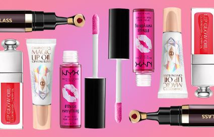 Lip oils on bright pink background
