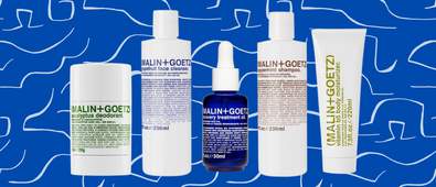 Malin + Goetz products on blue and white background