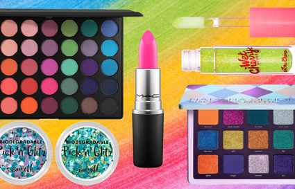 makeup products on rainbow background