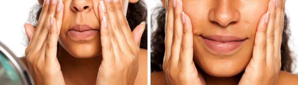 Woman massaging product into her cheeks