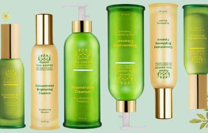 Tata Harper products on green floral background