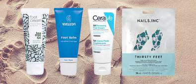 four foot care products on sandy background