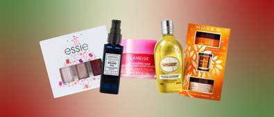 beauty gifts and products against green and red gradient background