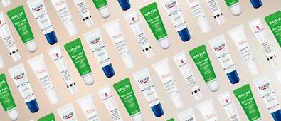 rows of diagonal lip balm tubes with a beige gradient background