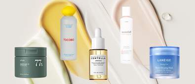 five different skincare products with different coloured cream swatches in the background