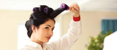 Woman curling hair v2