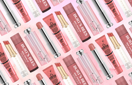 different pink lip balms on a pink watercolour background