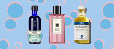 Three bottles of bath oils on a blue background with pink and blue bubbles
