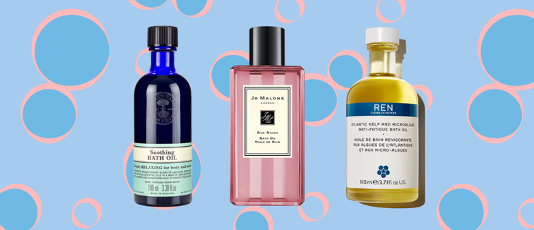 Three bottles of bath oils on a blue background with pink and blue bubbles