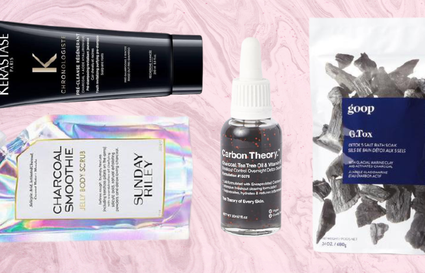 charcoal beauty products on pink background