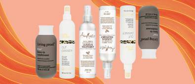 conditioner bottles on orange background