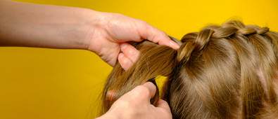 Hair plaiting brown hair