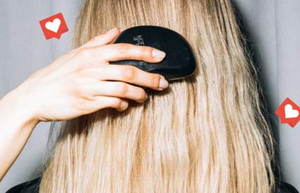 blonde hair being brushed