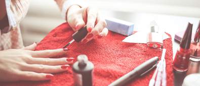 Woman painting her nails