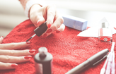 Woman painting her nails