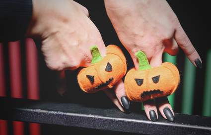 black manicure and pumpkin puppets