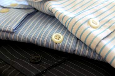 Folded cotton shirts. Image by <a href="https://pixabay.com/users/Gadini-388416/?utm_source=link-attribution&utm_medium=referral&utm_campaign=image&utm_content=591750">Adriano Gadini</a> from <a href="https://pixabay.com/?utm_source=link-attri