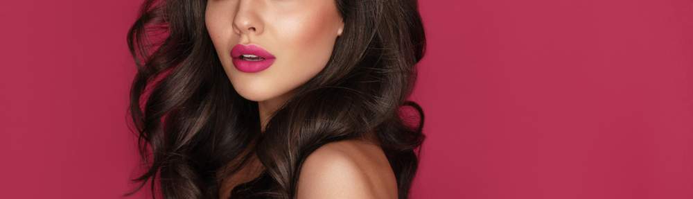 Brunette haired Woman Portrait with big, bouncy hair