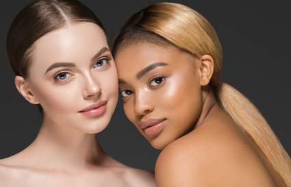 two girls with nude makeup on