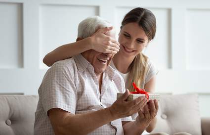 lady giving father's day present