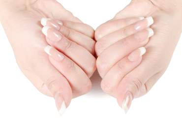 hands crossed showing acrylic nails